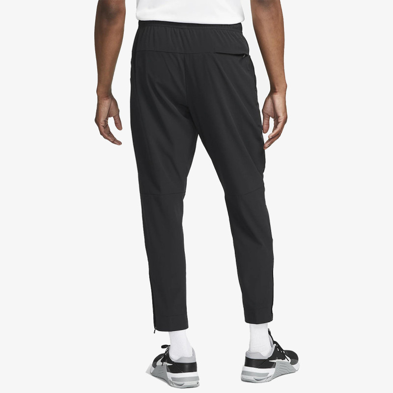 NIKE Donji deo trenerke Dri-FIT Unlimited 