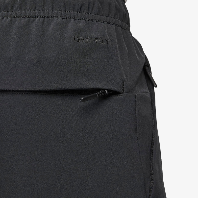NIKE Donji deo trenerke Dri-FIT Unlimited 