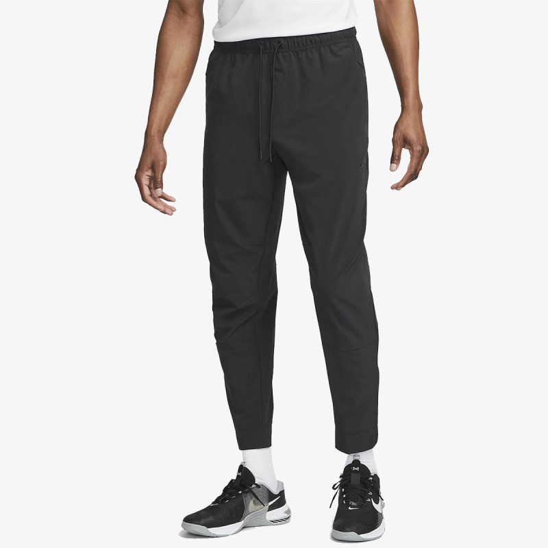 NIKE Donji deo trenerke Dri-FIT Unlimited 