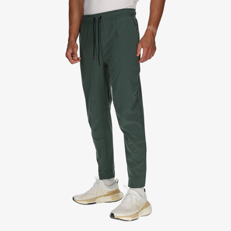 NIKE Donji deo trenerke Dri-FIT Unlimited 