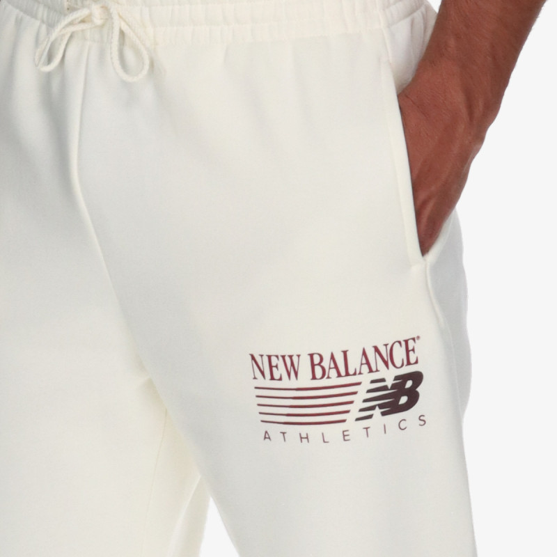 NEW BALANCE Donji deo trenerke Reimagined Graphic Fleece Jogger 